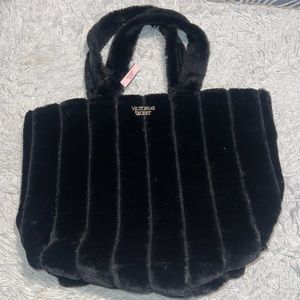 Victoria Secret tote bag.